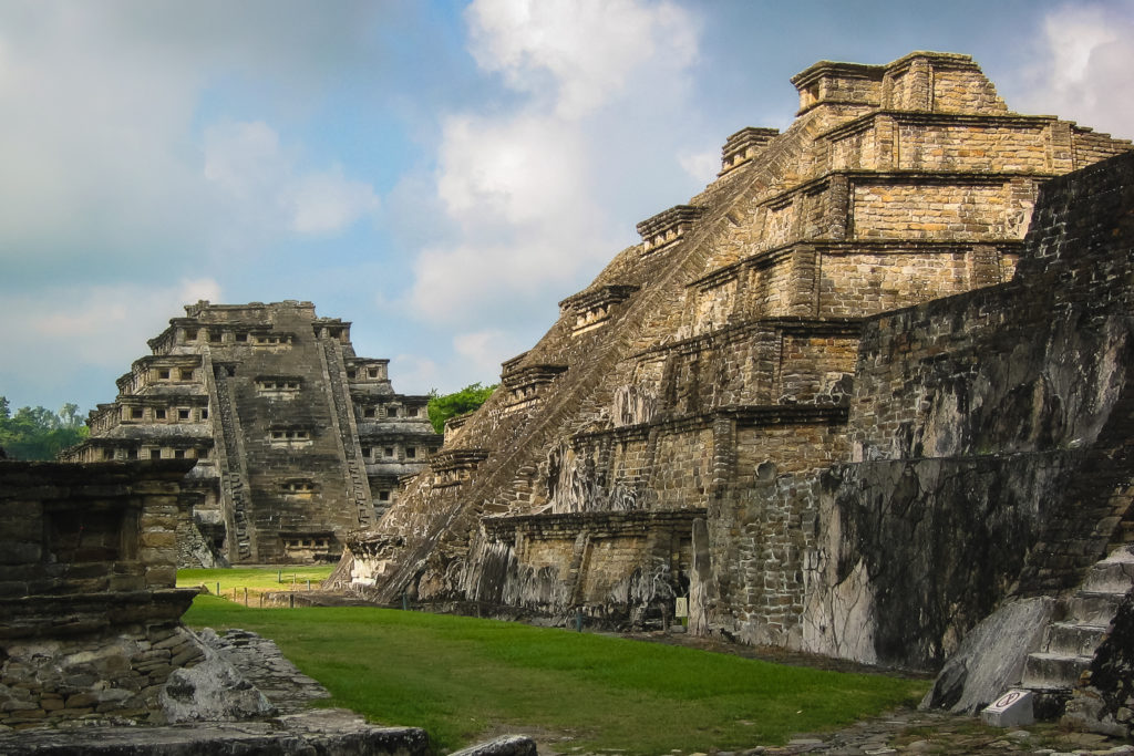 Featured in the blog "Walk in the Steps of Apocalypto Film Locations" by Jaya Travel & Tours this image shows the ancient maya ruins of El Tajin in Veracruz.