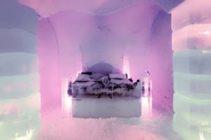 Tour a unique and cool hotel in sweden with Jaya Travel & Tours made out of ice, where guests can travel to spend the night in a hotel carved with ice sculptures and artwork.
