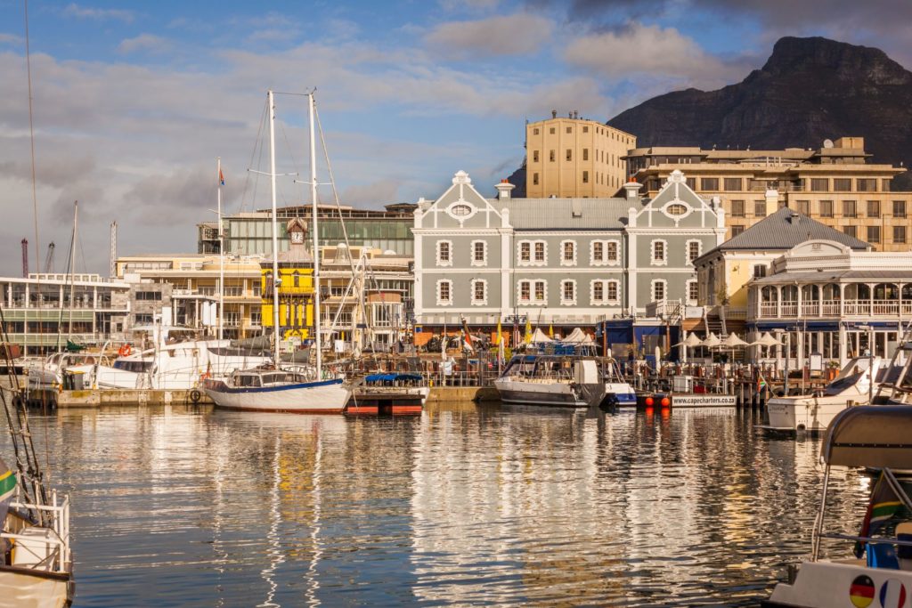 Featured in "Tour Film Locations of Blood Diamond" by Jaya Travel & Tours which shows a river filled with boats travel through the V&A Waterfront in Cape Town, South Africa.