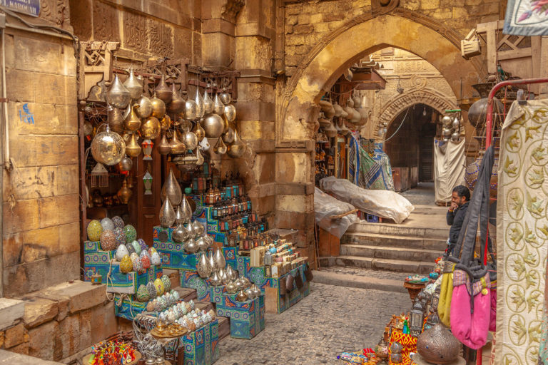 During an excursion with Jaya Travel & Tours, a Khan El Khalili market lamp and lantern shop is visited in Islamic Cairo, Egypt.