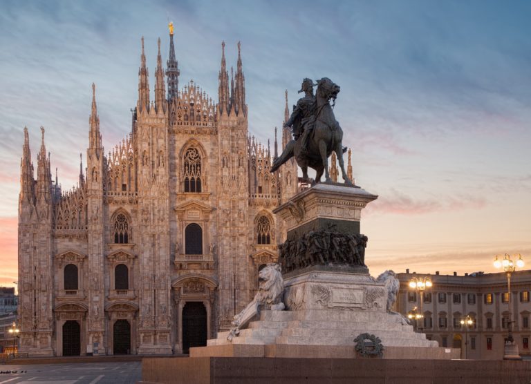 This image is featured in Jaya Travel & Tours customized tours page which promotes the personalized tourof enchanting Italy. In this photograph, the sun sets on the iconic Duomo in Milan, one of the most popular destinations.
