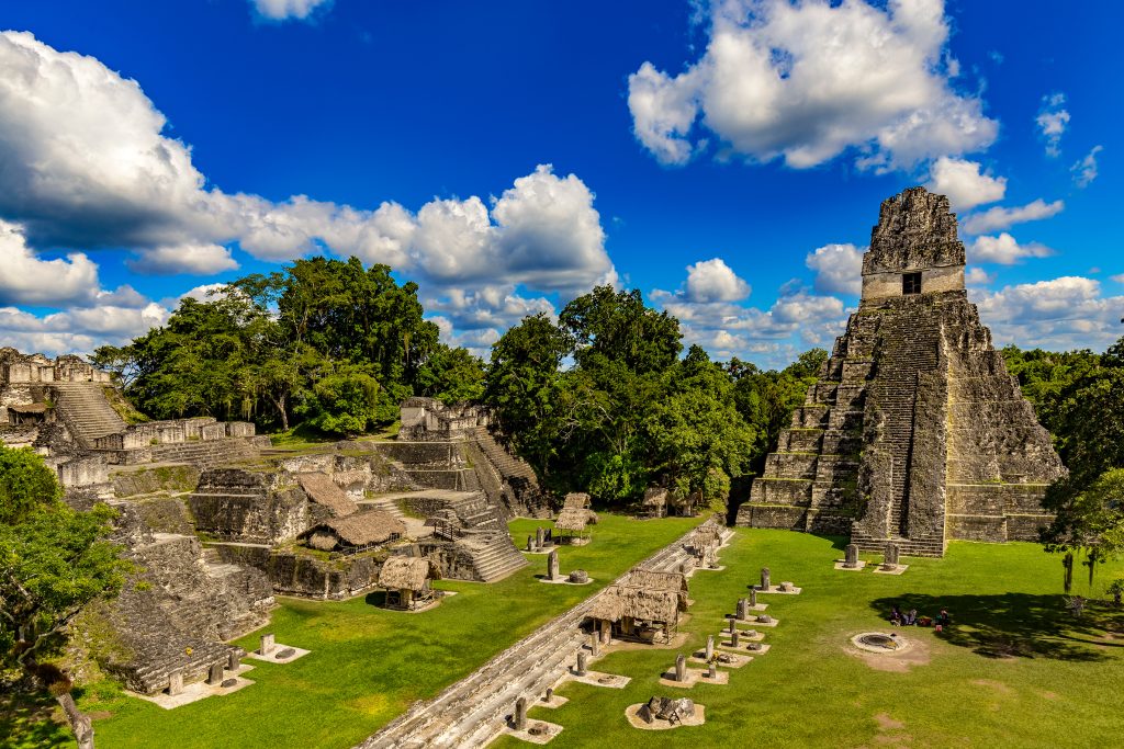 Featured in the blog "Walk in the Steps of Apocalypto Film Locations" by Jaya Travel & Tours, this image shows Tikal National Park in Guatemala.
