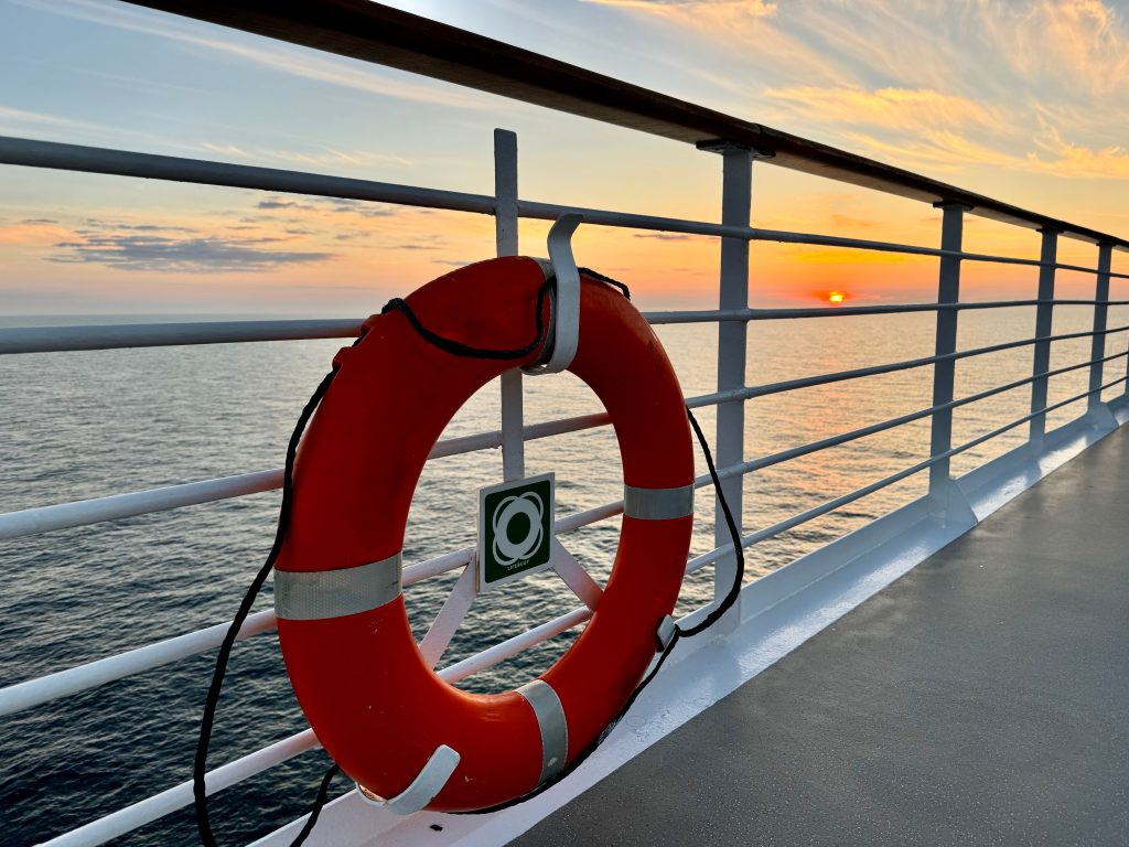 Cruise Agent: Why You Need One for Your Dream Cruise blog- Picture of a Rescue ring on board of MS Kong Harald cruise from Jaya Travel & Tours blog