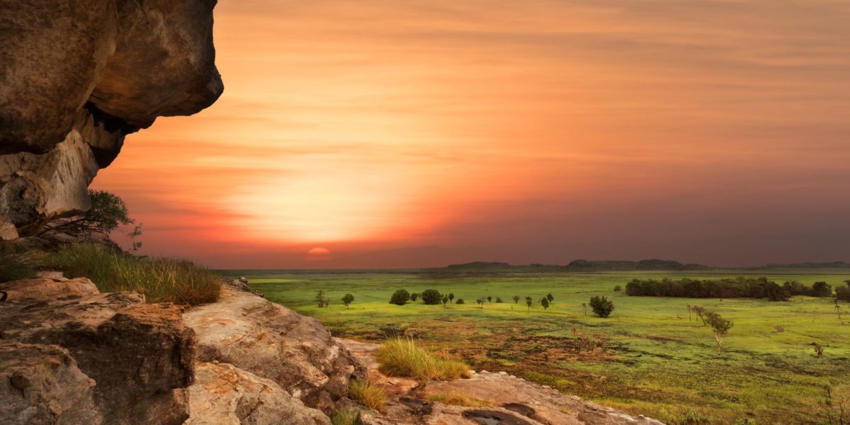 Featured in the Jaya Travel & Tours blog "Movie Locations from Out of Africa" this image shows the beautiful african savannah with a sunset over cliffs.