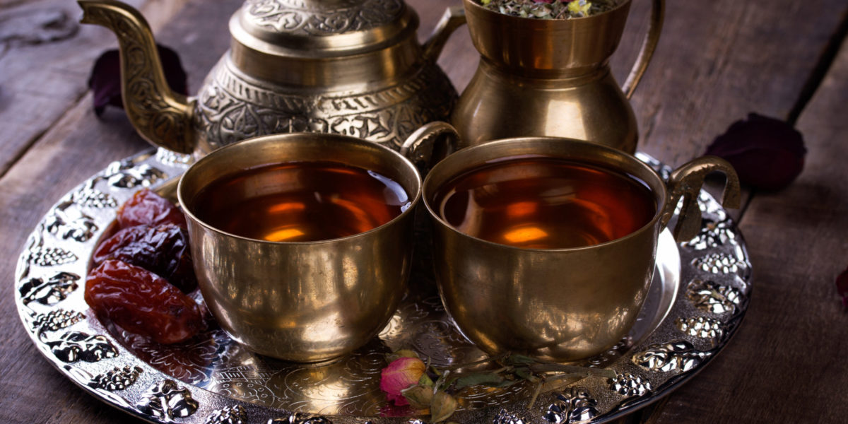 a platter of traditional arabic tea sits on a plate that you can drink when you travel to morocco with Jaya.